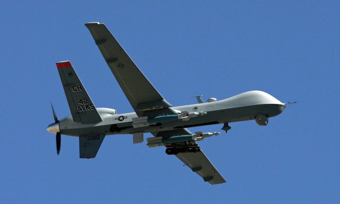 An MQ-9 Reaper drone flies at Creech Air Force Base in Indian Springs, Nevada on Aug. 8, 2007. (Ethan Miller/Getty Images)