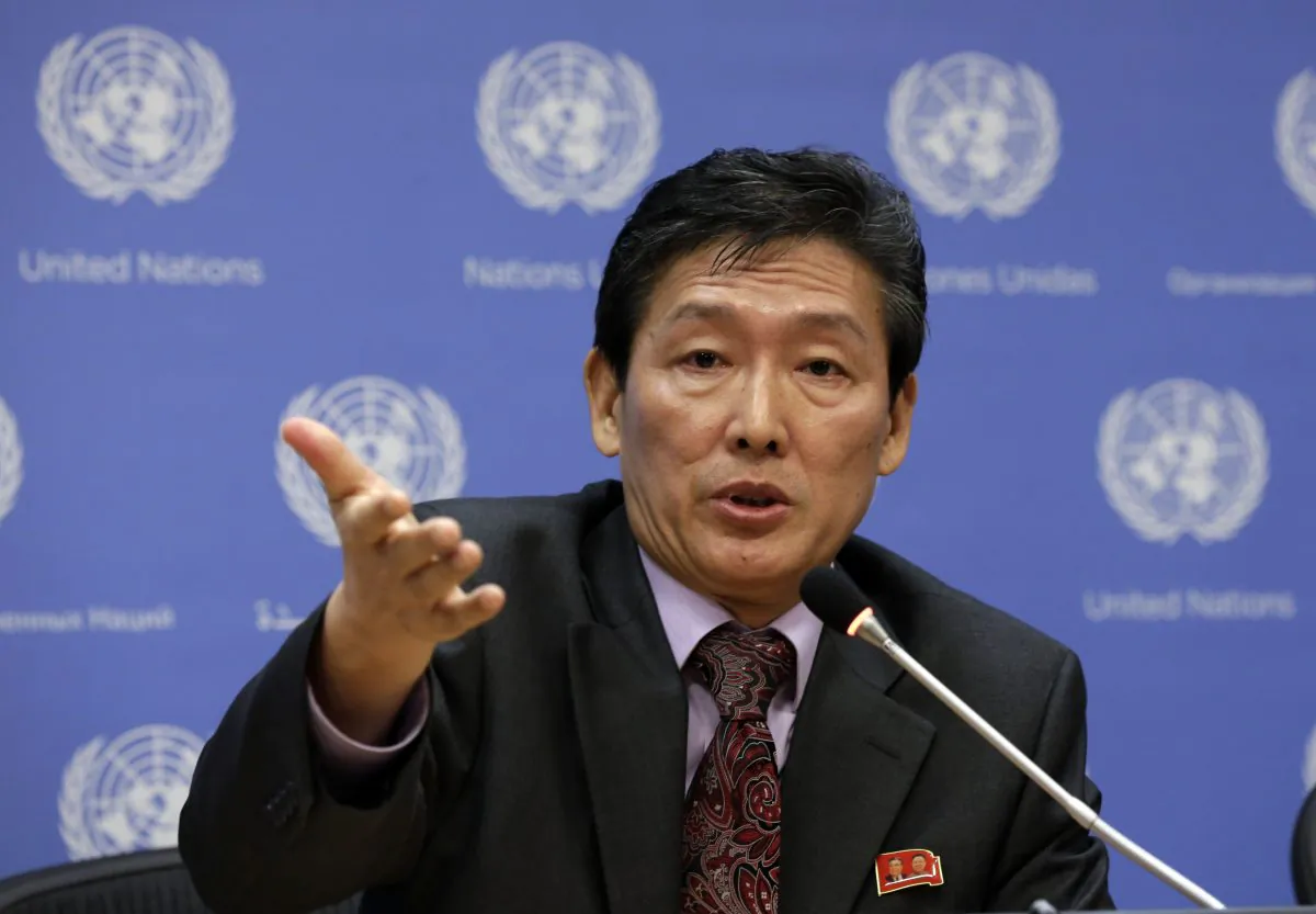 North Korea's deputy UN ambassador Ri Tong Il, responds to a question during his news conference at United Nations headquarters, on March 24, 2014. North Korea publicly acknowledged the existence of its labor camps for the first time Tuesday, Oct. 7, an admission that appeared to come in response to a highly critical UN human rights report earlier this year. The deputy UN ambassador said the secretary of his country's ruling Workers' Party had visited the EU, and that "we are expecting end of this year to open political dialogue between the two sides." The human rights dialogue would follow. (AP Photo/Richard Drew)