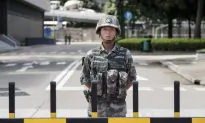 Beijing Meeting Considers Imposing Martial Law on Hong Kong