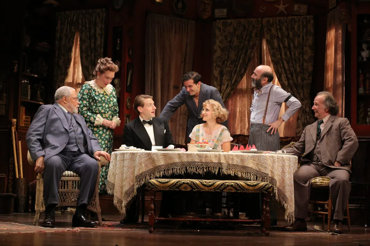 (L–R) James Earl Jones, Kristine Nielsen, Fran Kranz, Reg Rogers, Annaleigh Ashford, Patrick Kerr, and Mark Linn-Baker play the loveable eccentrics in “You Can’t Take It With You.” (Joan Marcus)