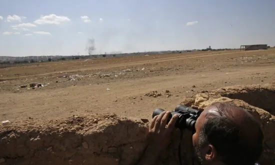 Airstrikes Push Jihadists Back in Syrian Town