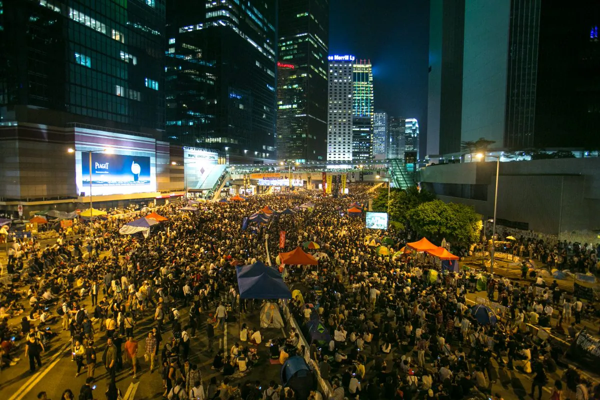 Thousands of pro-democratic protesters fill what they are now calling "Umbrella Square," in the Central District of Hong Kong, where all of the Government officers are on Oct. 10, 2014. Thousands came in support of the protest after the Government canceled today's talks with the organizers of the movement. (Benjamin Chasteen/Epoch Times)