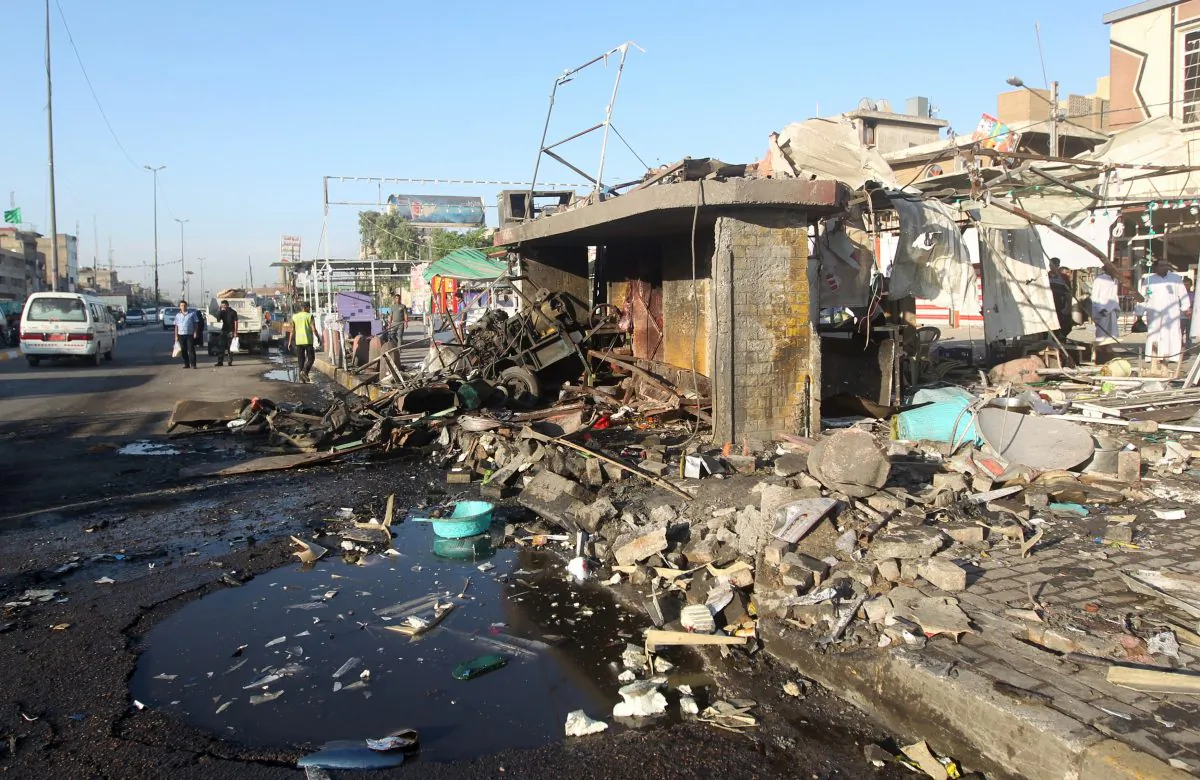 A picture shows the site of an explosion in the aftermath of a car bomb attack in the mostly Shiite Sadr City district of Baghdad on Oct. 9, 2014. (Ahmad al-Rubaye/AFP/Getty Images)
