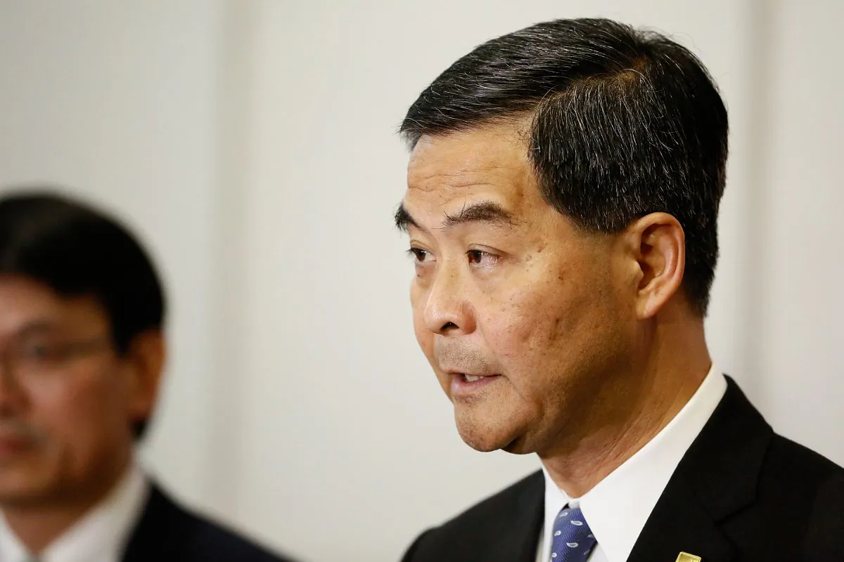 Hong Kong Chief Executive Leung Chun-ying speaks to Hong Kong journalists at a press conference during the APEC Summit on Oct. 6, 2013, in Nusa Dua, Indonesia. After Leung spoke on Hong Kong TVB calling the Occupy Central movement "out of control," the three organizations participating in the pro-democracy movement issued a statement calling for Leung to step down, on Oct. 12, 2014. (Putu Sayoga/Getty Images)
