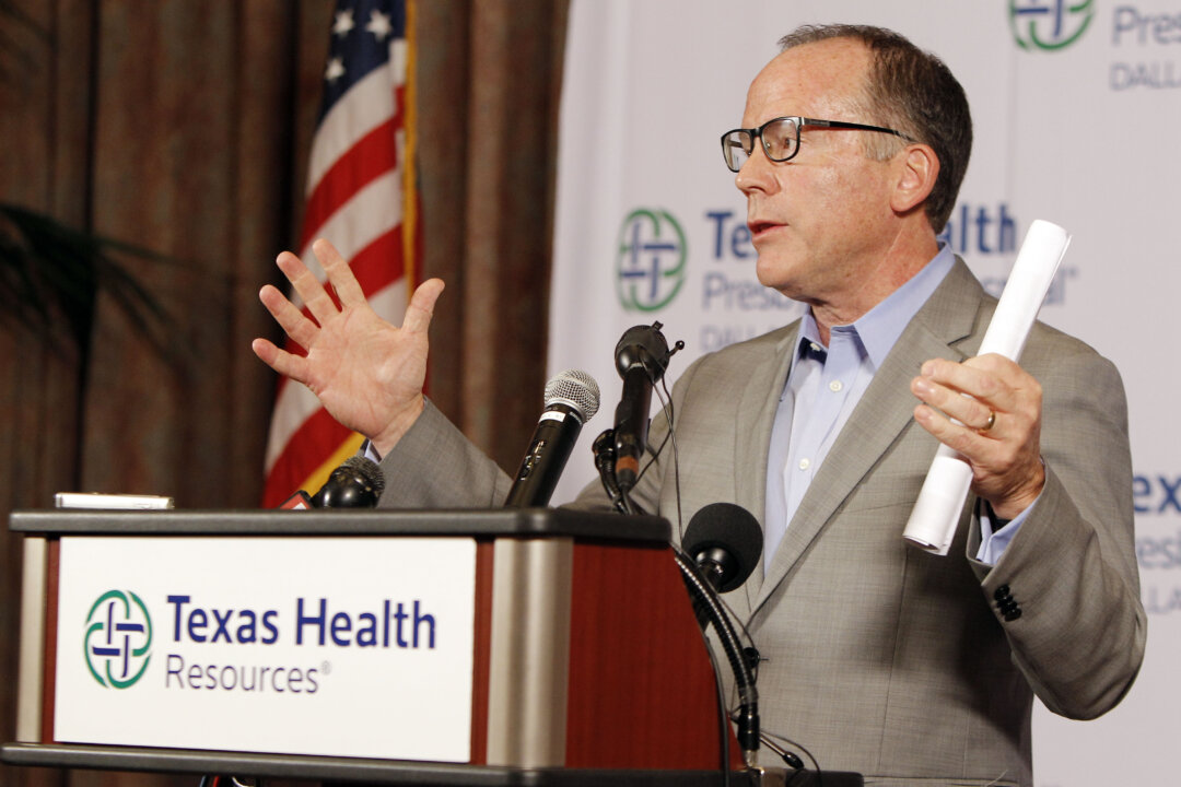 Texas Health Presbyterian Hospital Chief Clinical Officer Dr. Daniel Varga answers questions about a health care worker  who provided hospital care for Thomas Eric Duncan who contracted Ebola, during a press conference at the hospital, Sunday, Oct. 12, 2014, in Dallas. Varga says the worker was in full protective gear when they provided care to Duncan during his second visit to Texas Health Presbyterian Hospital. (AP Photo/Brandon Wade)