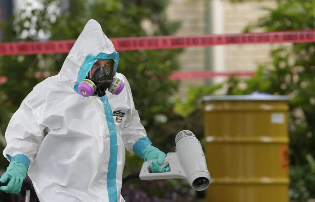 A hazmat worker is seen in a file photo. (AP Photo/LM Otero)
