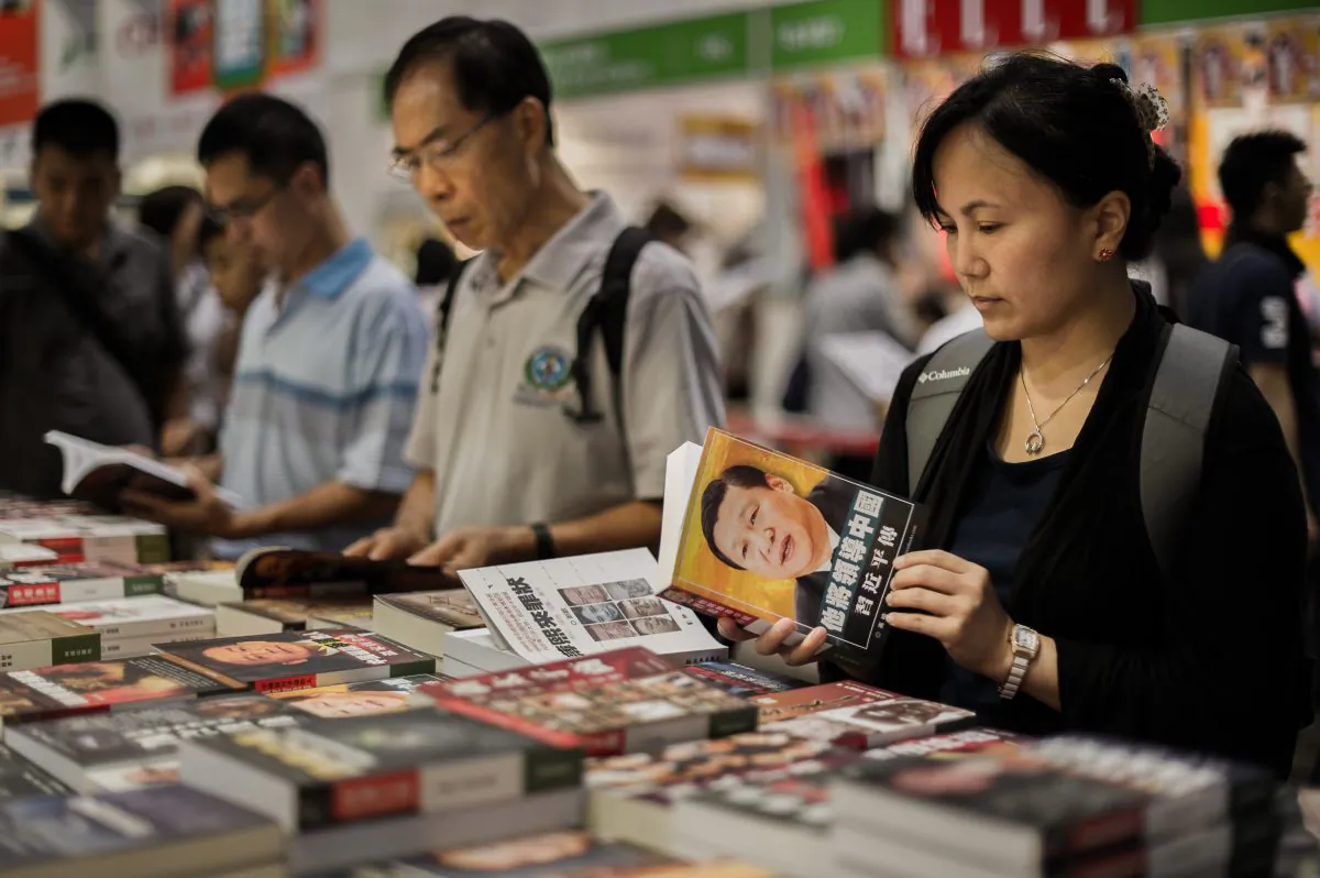 Visitors browse Chinese political books at the Hong Kong Book Fair in Hong Kong on July 18, 2012. (Philippe Lopez/AFP/GettyImages) 