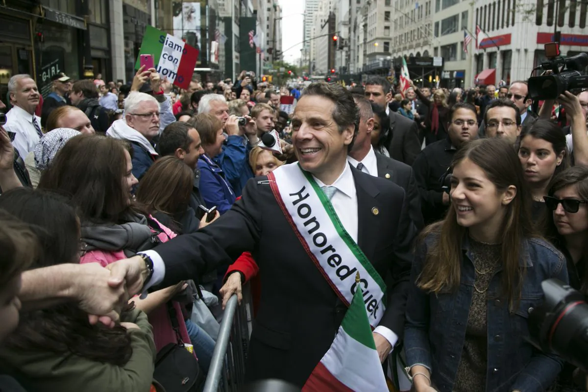 ov. Andrew Cuomo and his daughter Michaela Cuomo greet the public at the New York City Columbus Day Parade in Manhattan, New York, Oct. 13, 2014. (Samira Bouaou/Epoch Times)