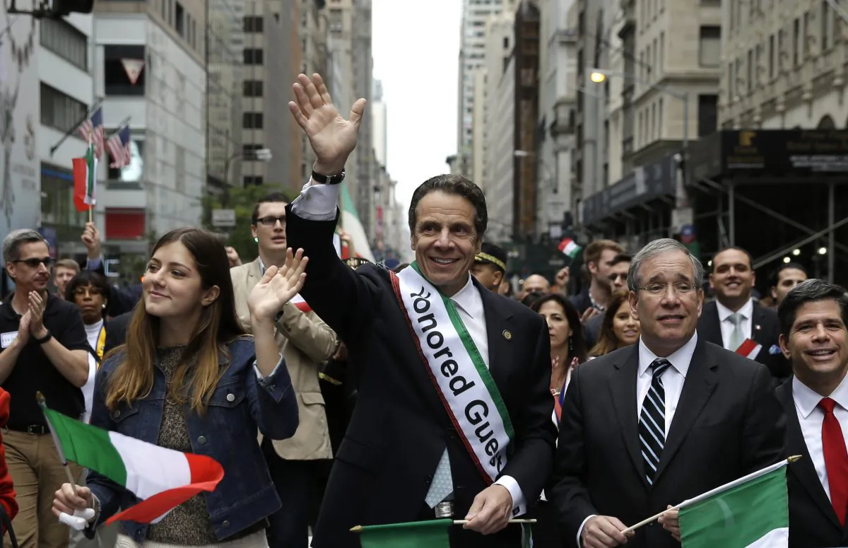 New York Governor Andrew Cuomo marches in the Columbus Day parade in New York, Monday, Oct. 13, 2014. (AP Photo/Seth Wenig)
