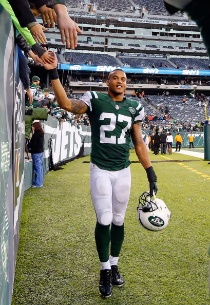 EAST RUTHERFORD, NJ - DECEMBER 22:  (NEW YORK DAILIES OUT)    Dee Milliner #27 of the New York Jets greets fans after a game against the Cleveland Browns on December 22, 2013 at MetLife Stadium in East Rutherford, New Jersey. The Jets defeated the Browns 24-13.  (Photo by Jim McIsaac/Getty Images)