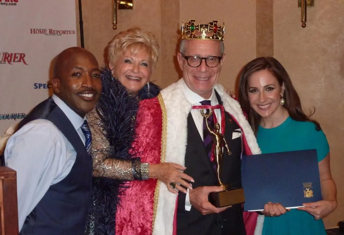 Dennis Weinstein, director of advertising at Touro College in New York City was honored at the 2014 Kings of Queens dinner and awards ceremony sponsored by The Queens Courier at Terrace on the Park in Flushing Meadows on Sept. 18. With Weinstein (second from right) are, left to right, Fox 5 News Anchor Antwan Lewis, Queens Courier publisher and CEO Victoria Schneps, and Fox 5 News Reporter Teresa Priolo. Lewis and Priolo emceed the event.  (Courtesy Touro College)