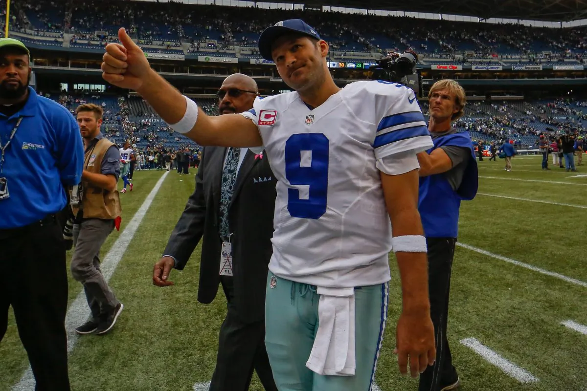 Tony Romo of the Dallas Cowboys leaves the field after a win over the Seattle Seahawks at CenturyLink Field on Oct. 12, 2014 in Seattle. (Otto Greule Jr/Getty Images)