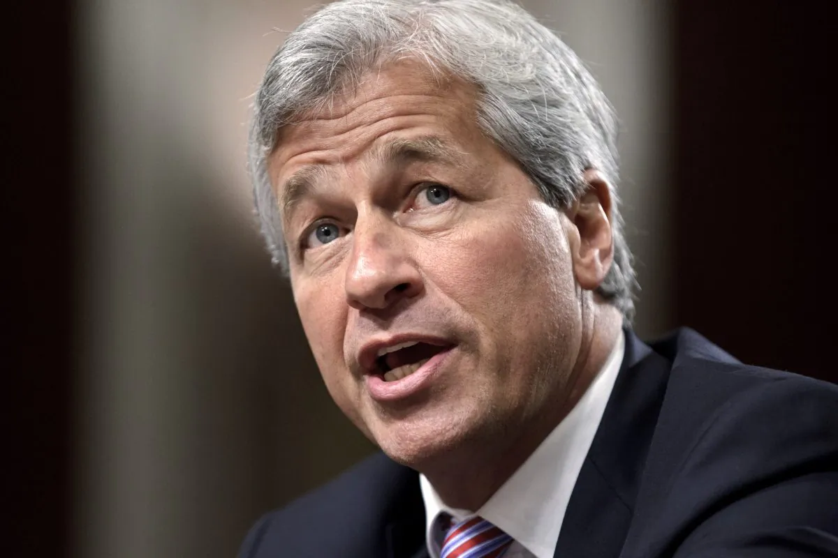 JPMorgan Chase CEO Jamie Dimon testifies before the Senate Banking Committee on Capitol Hill in Washington, on June 13, 2012. Dimon said on Tuesday, Oct. 14, 2014, that more coordination between businesses and government is needed to combat the rising threat of cyberattacks. (AP Photo/J. Scott Applewhite)
