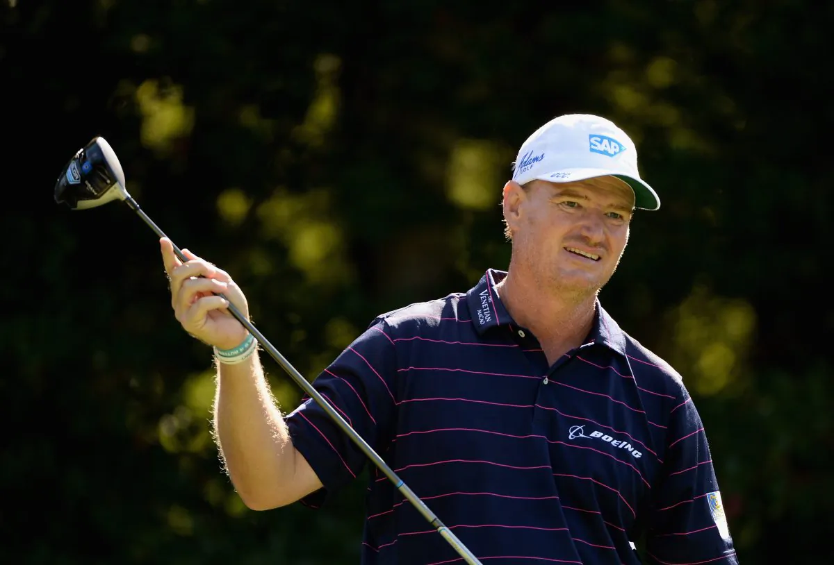 Ernie Els of South Africa reacts after his tee shot on the fourth hole during the second round of the Deutsche Bank Championship at the TPC Boston on Aug 30, 2014 in Norton, Massachusetts. (Photo by Ross Kinnaird/Getty Images)