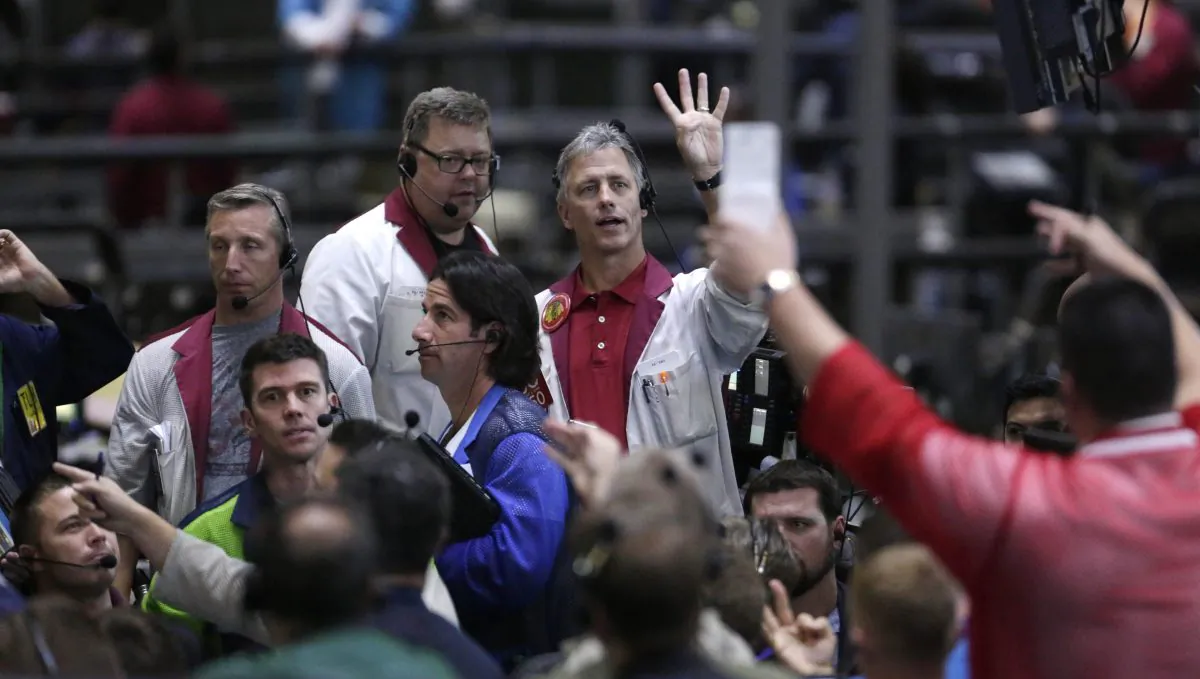 Traders work in the ten-year bond pit on the floor of the CME Group in Chicago on Sept. 24, 2014. Main Street investors have poured a trillion dollars into bonds since the financial crisis, and helped send prices soaring. As fund managers and regulators fret about an inevitable sell-off, the bigger fear is that when people go to unload, there wont be anyone to buy. (AP Photo/M. Spencer Green)