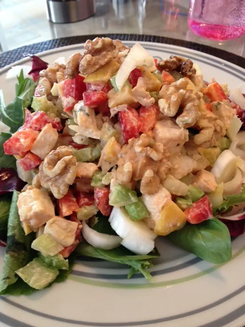 Poaching chicken is easy and will provide a number of versatile and tasty meals like the chicken walnut salad shown above (photo by LivligaHome).