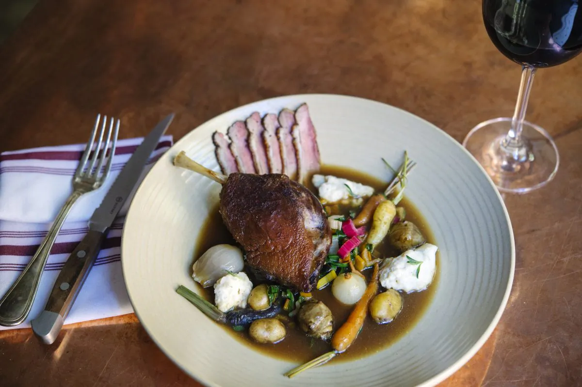 Duck Fricot with carrots, Swiss chard, dumplings, and savory. (Courtesy of King Bee)