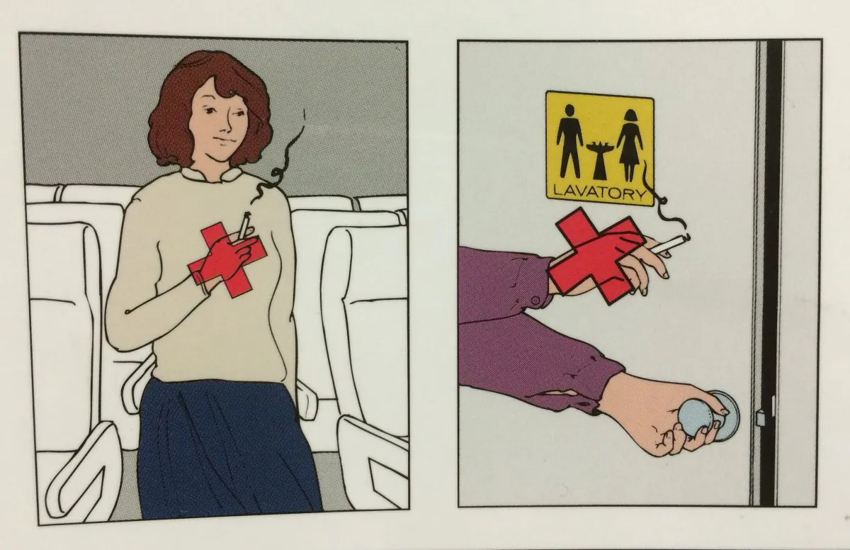 Photo of airplane safety instructions, no smoking sign.