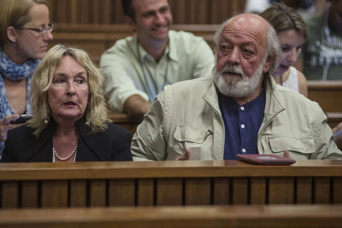 June, left, and Barry Steenkamp, parents of the late Reeva Steenkamp, attend court on the third day of mitigation of sentencing for Oscar Pistorius at the high court in Pretoria, South Africa, Wednesday, Oct. 15, 2014. Pistorius faces sentencing this week in the South African court after being convicted of culpable homicide for killing his girlfriend Reeva Steenkamp.  (AP Photo/Ihsaan Haffejee. Pool)