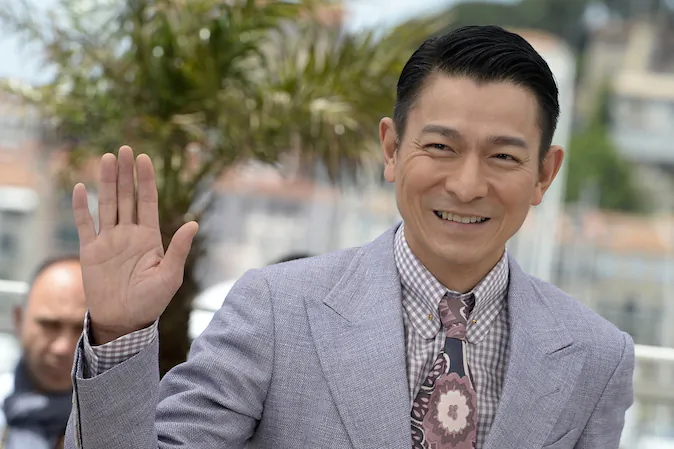 Chinese actor Andy Lau waves on May 20, 2013 while posing during a photocall for the film 'Blind Detective' presented Out of Competition at the 66th edition of the Cannes Film Festival in Cannes. Cannes, one of the world's top film festivals, opened on May 15 and will climax on May 26 with awards selected by a jury headed this year by Hollywood legend Steven Spielberg. (Anne-Christine Pouiloulat/AFP/Getty Images)