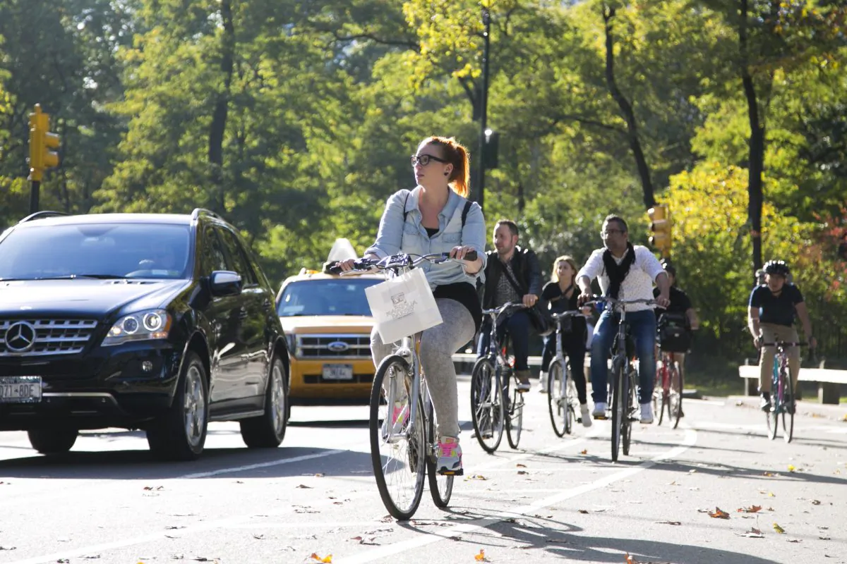 People ride bicycles on the Central Park loop in Manhattan, New York, Oct. 14, 2014. (Samira Bouaou/Epoch Times)
