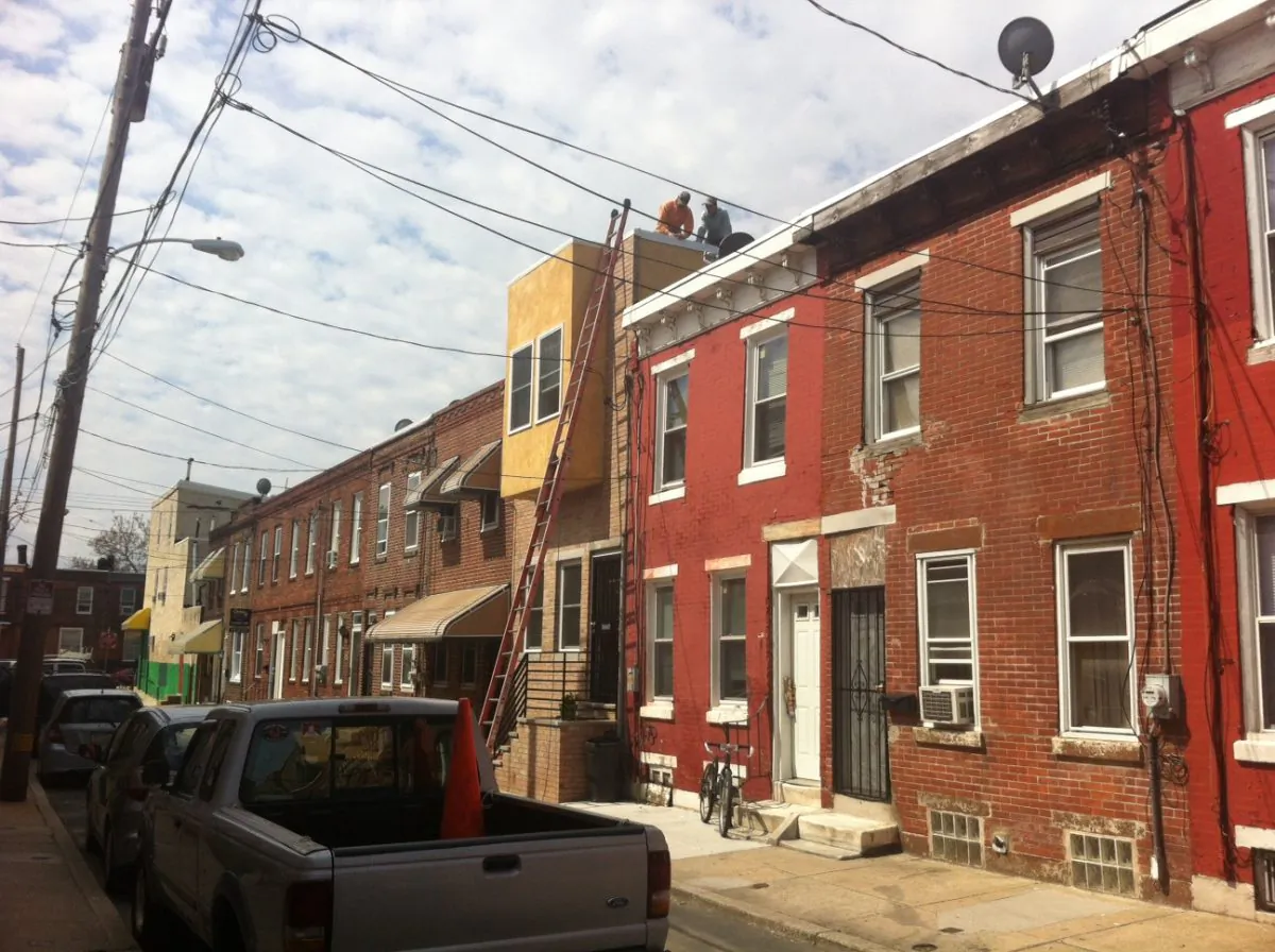 Homes under renovation in Philadelphia. (Courtesy of MCG)