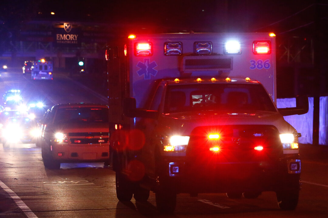 Ebola patient Amber Vinson arrives by ambulance at Emory University Hospital on October 15, 2014 in Atlanta, Georgia. (Kevin C. Cox/Getty Images)