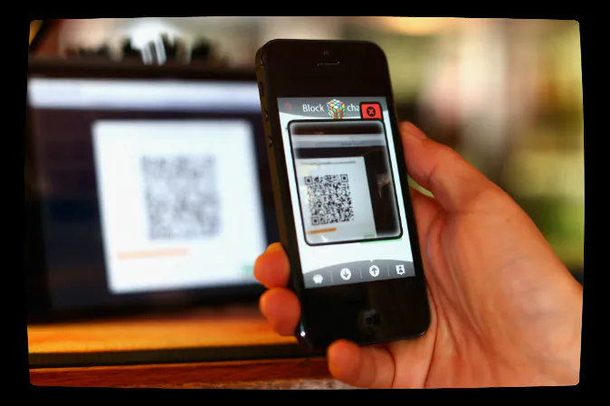 In this photo illustration, a customer scans a QR code to pay for drinks using bit coins in Sydney, Australia on Sept. 19, 2013. (Cameron Spencer/Getty Images; effects added by Epoch Times)