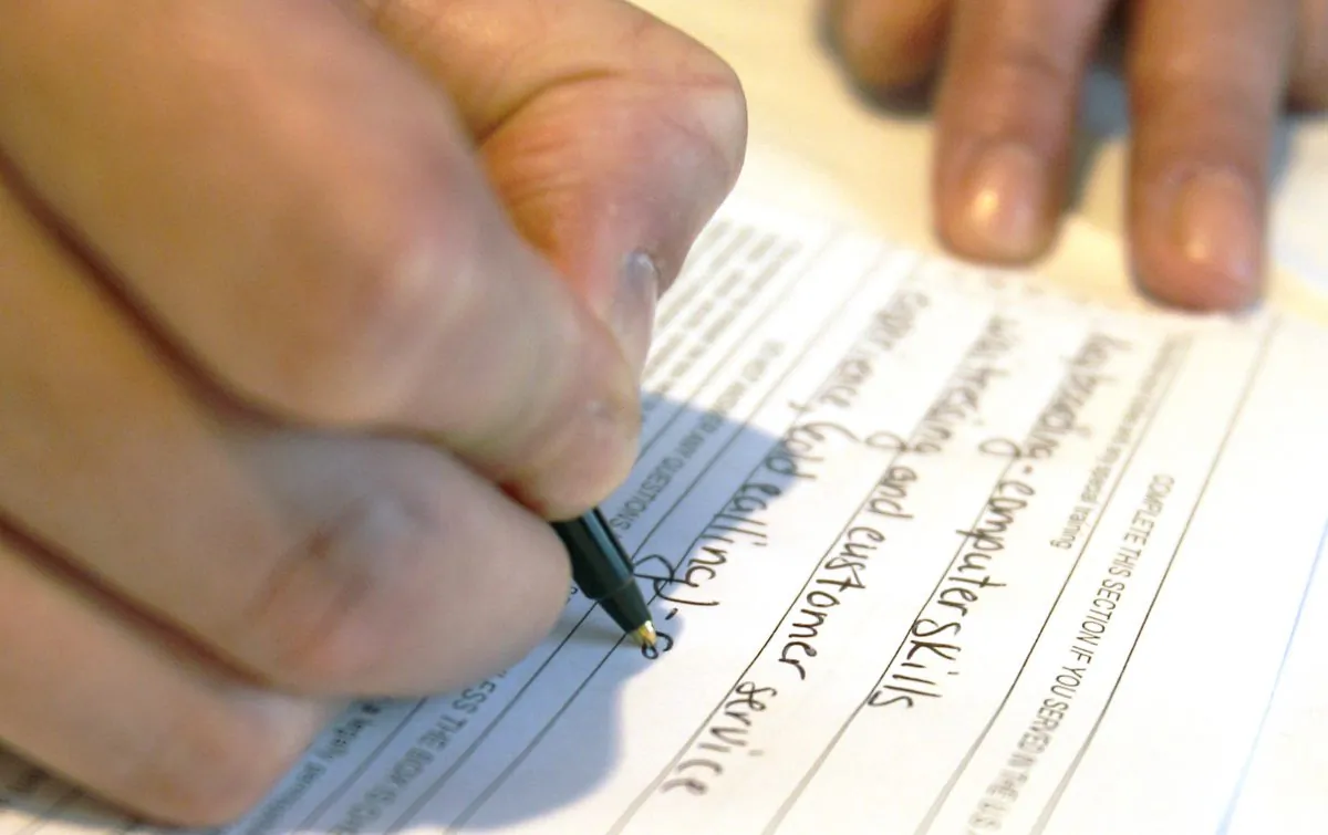 Sonya Mosey from Altoona, Pa., fills out an employment application for Gillece Services at the Pittsburgh Career Fair, in Pittsburgh, on July 21, 2011. The US Labor Department on Thursday, Oct. 16, 2014, reports on the number of people who applied for unemployment benefits for the week ending Oct. 11, 2014. (AP Photo/Keith Srakocic)