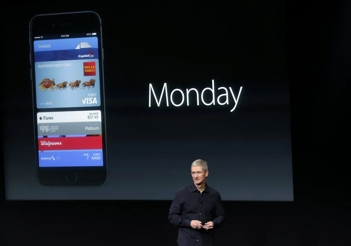 pple CEO Tim Cook discusses the new Apple Pay product during an event at Apple headquarters in Cupertino, Calif. on Thursday, Oct. 16, 2014. (AP Photo/Marcio Jose Sanchez)