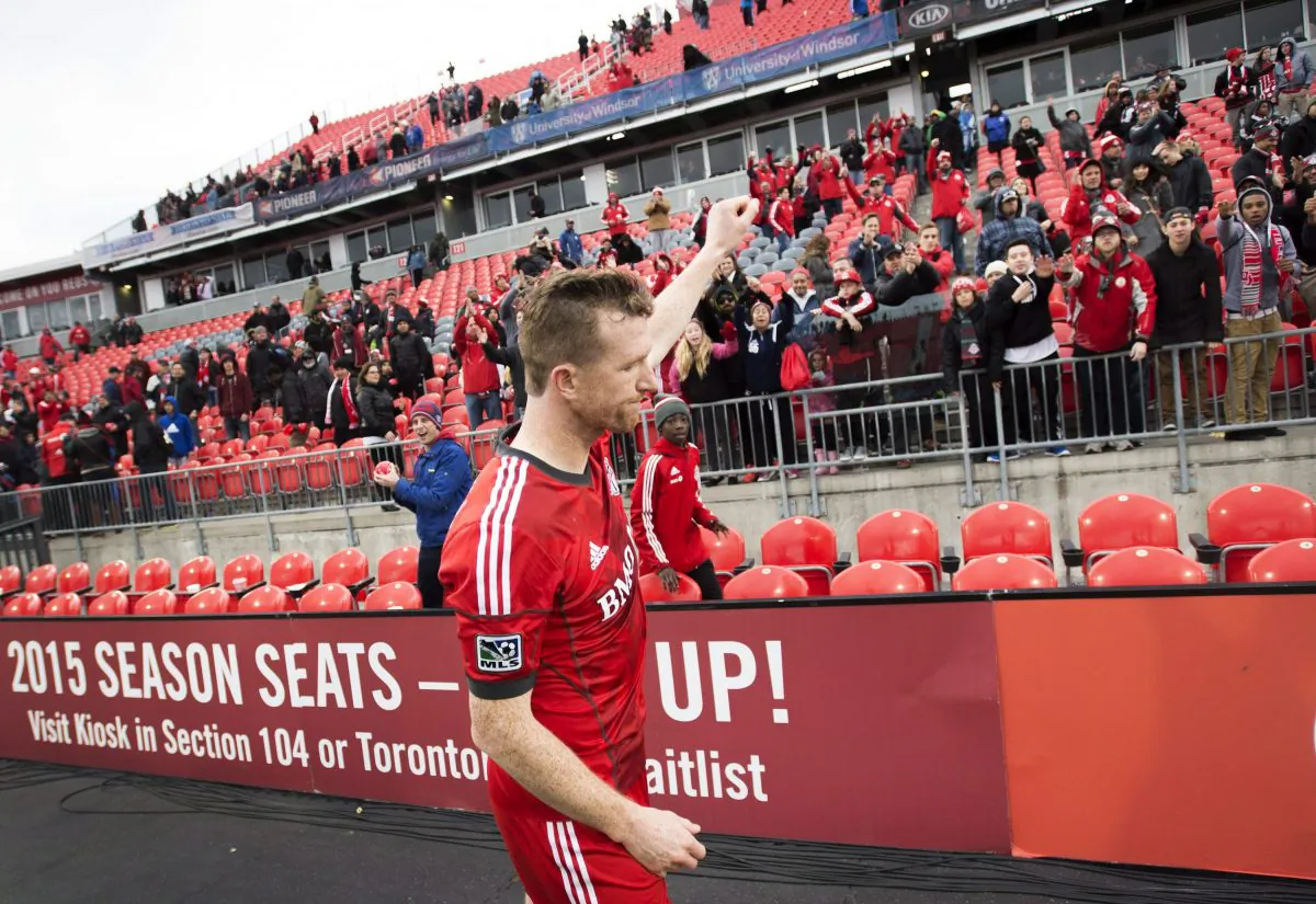 Toronto FC captain Steven Caldwell acknowledges the crowd following the club's final home game of the MLS regular season against the Montreal Impact in Toronto on Sat. Oct. 18, 2014. (The Canadian Press/Darren Calabrese)
