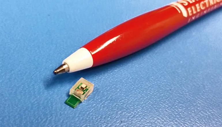 The current prototype is the size of the head of a ballpoint pen. Researchers hope to design a next-generation implant one-tenth that size. The goal is to produce smaller devices that could be used to create a network of electrodes to study the brains of experimental animals in ways not currently possible. (Arbabian Lab/Stanford School of Engineering)