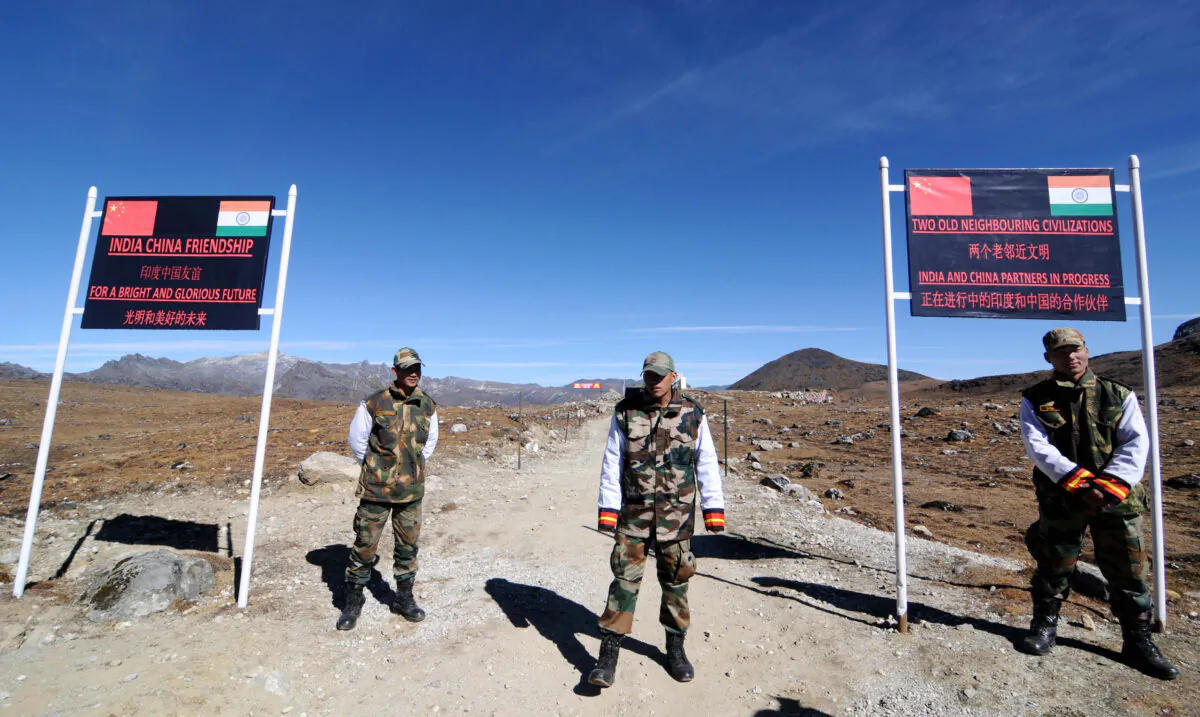 Indian Army personnel keep vigilance at Bumla pass at the India-China border in Arunachal Pradesh on Oct. 21, 2012. Bumla is the last Indian Army post at the India-China border at an altitude of 15,700 feet above sea level. (Biju Boro/AFP/Getty Images)