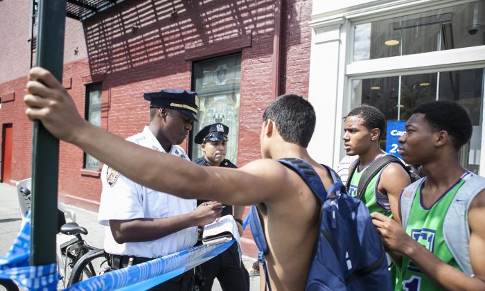 A file photo of police at a crime scene in New York City, July 28, 2014. (Samira Bouaou/Epoch Times)