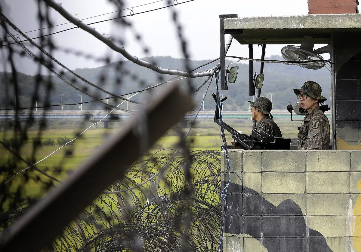 South Korean army soldiers stand guard at a military checkpoint on Sept. 17, 2014, at the Imjingak Pavilion near the border village of Panmunjom, which has separated the two Koreas since the Korean War, in Paju, South Korea. (AP Photo/Ahn Young-joon)