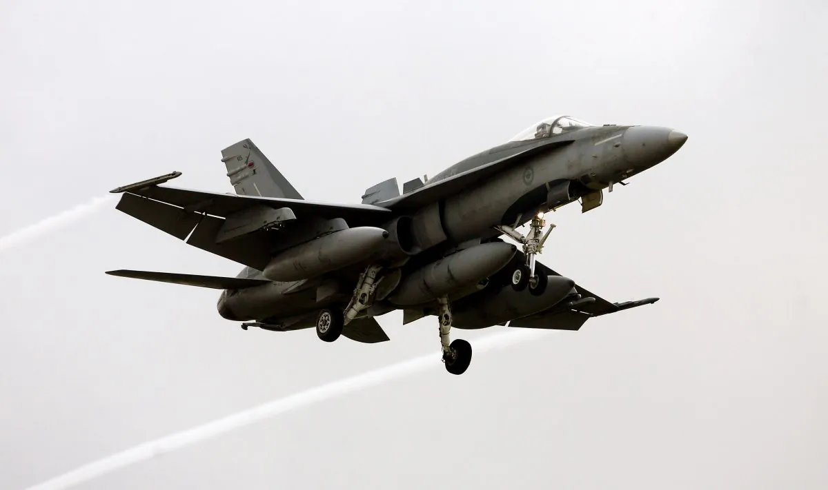 An F18 Hornet of the Canadian air force prepares to land at the Trapani Birgi air base in the southern island of Sicily on March 18, 2011. (Marcello Paternostro/AFP/Getty Images)