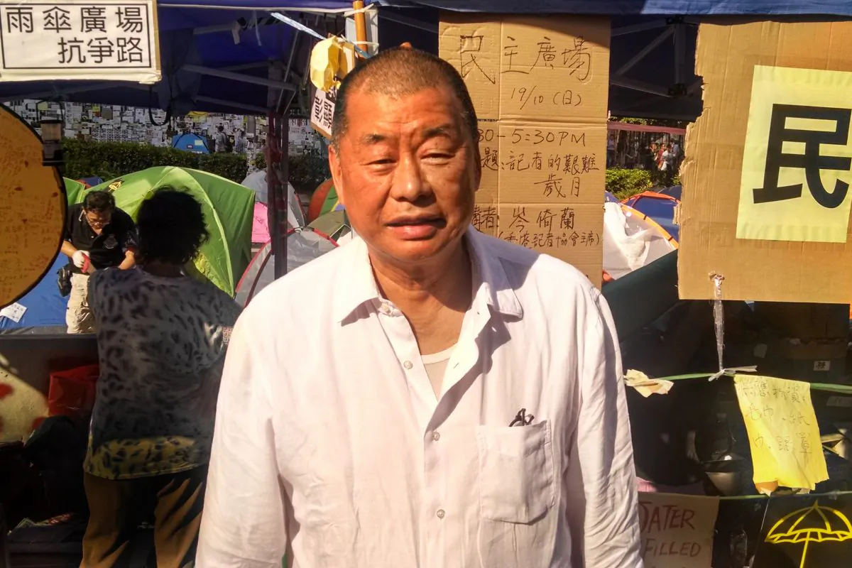 Jimmy Lai stands outside the shelter he sometimes uses in the Occupy Central encampment in the neighborhood of Admiralty, in Hong Kong on Oct. 20, 2014. (Matthew Robertson/Epoch Times Staff) 