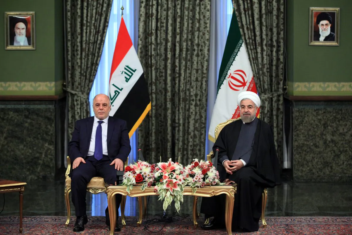 Iraqi Prime Minister Haidar al-Abadi (L) meets with Iran's President Hassan Rouhani, at Tehran's Saadabad Palace on Tuesday, Oct. 21, 2014. Rouhani said Iran will stand by its neighbor Iraq in its fight against the Sunni extremists of the Islamic State group and will continue to provide Baghdad with military advisers and weapons, according to a report by the official IRNA news agency. He also criticized the US for allegedly failing to sufficiently support Iraq. (AP Photo/Ebrahim Noroozi)