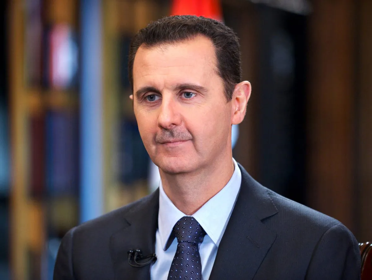 Syrian President Bashar Assad speaks during an interview with Venezuela's state-run Telesur network, in Damascus, Syria, on Sept. 25, 2013. Syrian President Bashar Assad is taking advantage of the US-led coalition's war against the Islamic State group to pursue a withering air and ground campaign against more mainstream rebels elsewhere in the country, trying to recapture areas considered more crucial to the survival of his government. (AP Photo/SANA)