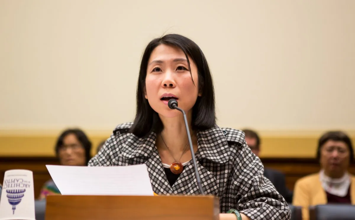 Danielle Wang, daughter of Wang Zhiwen, testifies on Capitol Hill before the House Foreign Affairs Committee on Dec. 5, 2013. On Oct. 18, Wang Zhiwen was abducted to a brainwashing center in Beijing after being released from prison. (Lisa Fan/Epoch Times)