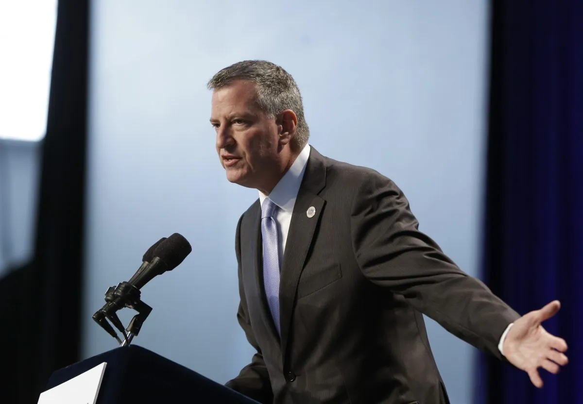 New York City Mayor Bill de Blasio at an education session in New York, Tuesday, Oct. 21, 2014. Anti-hunger advocates called on Mayor Bill de Blasio to make good on a campaign promise and serve breakfast as part of the regular school day at New York City public schools. (AP Photo/Seth Wenig)