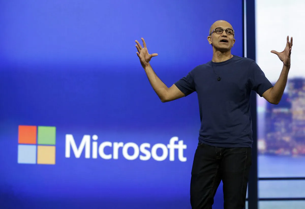 Microsoft CEO Satya Nadella gestures during the keynote address of the Build Conference in San Francisco on April 2, 2014. Microsoft plans to offer a glimpse of its vision for Windows on Tuesday, Sept. 30, 2014, as Nadella seeks to redefine the company and recover from missteps with its flagship operating system. (AP Photo/Eric Risberg)