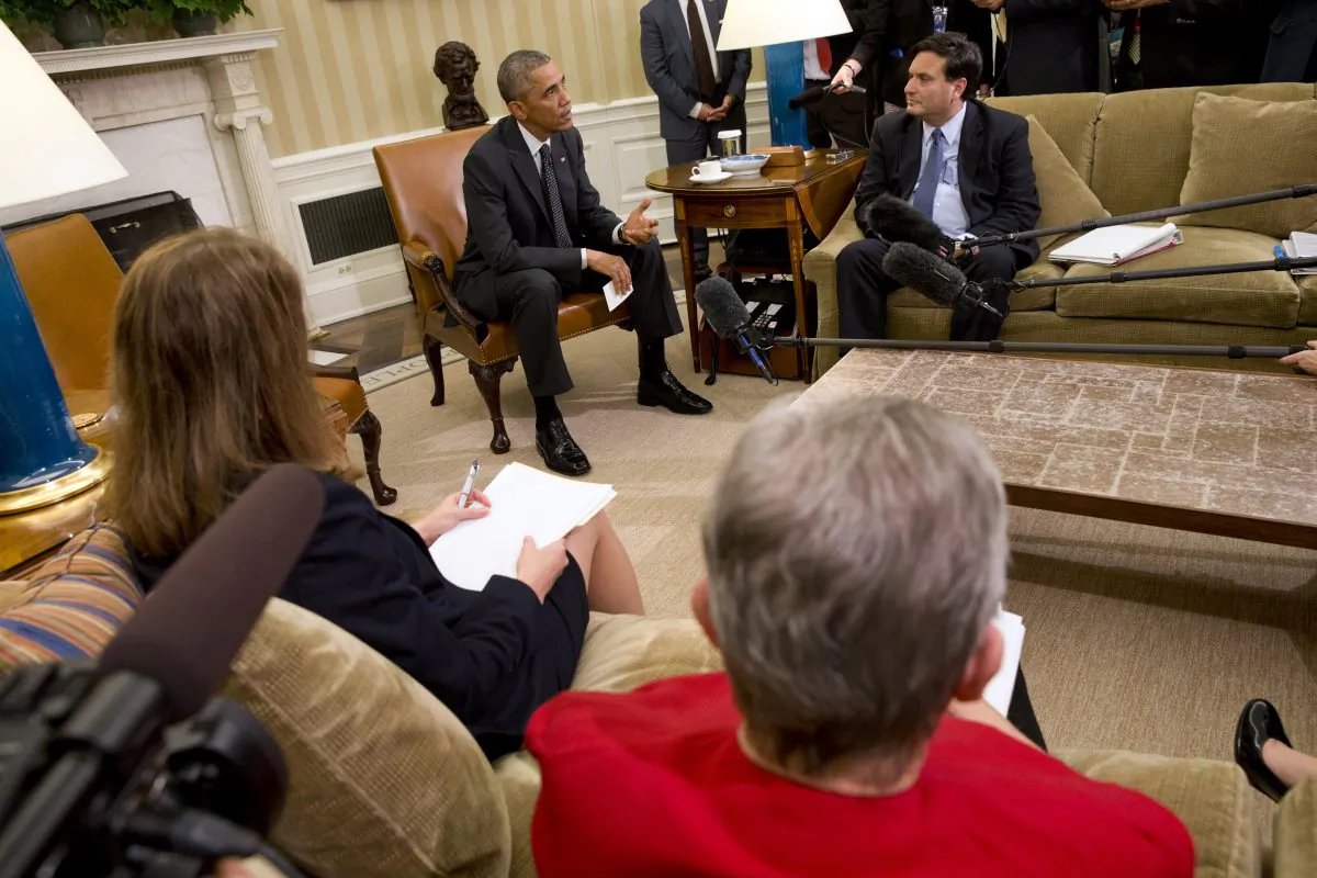 President Barack Obama, back left, with Ebola coordinator Ron Klain and members of his team coordinating the governments Ebola response, speak to the media after their meeting in the Oval Office of the White House, Wednesday, Oct. 22, 2014, in Washington. At front left is Sylvia Burwell, Secretary of Health and Human Services, and Ambassador Nancy Powell, Special Coordinator for Ebola Response Unit. (AP Photo/Jacquelyn Martin)