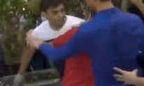 WATCH: Anti-Occupy Central Member Stabs Umbrella Movement Protester