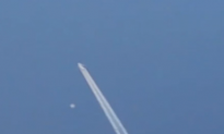 Is This a UFO Next to Airplane Over Los Angeles? (Video)