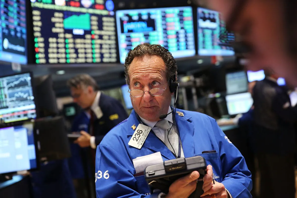 A trader works on the floor of the New York Stock Exchange (NYSE) on Oct. 21, 2014, in New York City. (Spencer Platt/Getty Images)