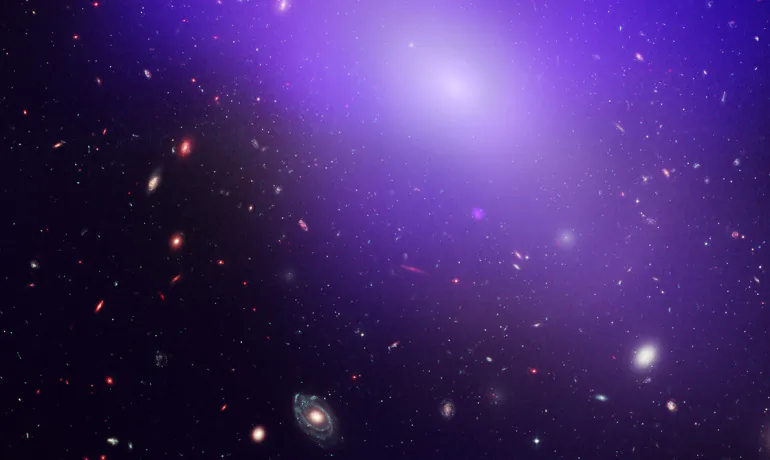 This image shows elliptical galaxy NGC 1132, as seen by NASA's Chandra X-Ray Observatory. The blue/purple in the image is the X-ray glow from hot, diffuse gas that is not forming into stars. (NASA, ESA, M. West [ESO, Chile], and CXC/Penn State University/G. Garmire, et al.)