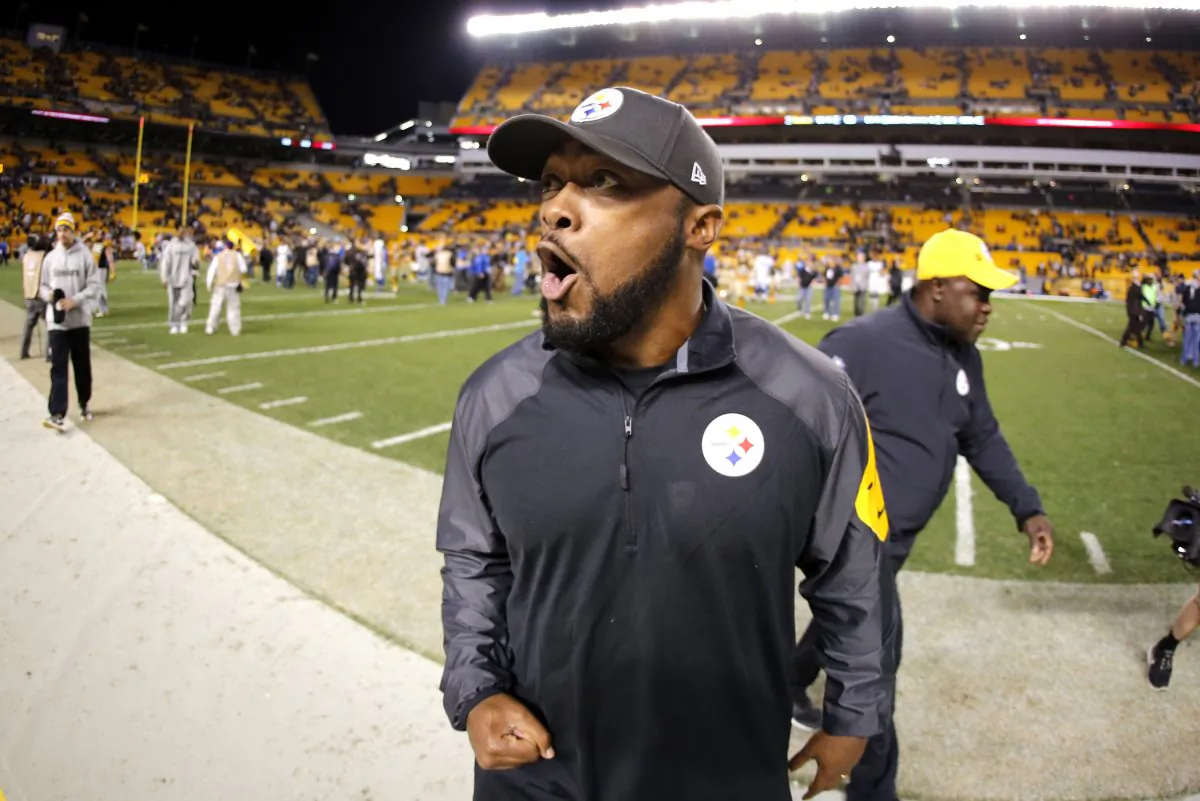 Pittsburgh Steelers head coach Mike Tomlin walks off the field after a 51-34 win over the Indianapolis Colts in an NFL football game in Pittsburgh, Sunday, Oct. 26, 2014. (AP Photo/Gene J. Puskar)