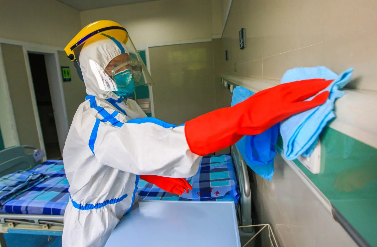 Medical staff performs an Ebola-preventing exercise on September 11, 2014 in Foshan, Guangdong province of China. China tests body temperature of participants of China’s largest trade expo Canton Fair in Guangzhou on Oct. 23, 2014. (ChinaFotoPress/Getty Images)