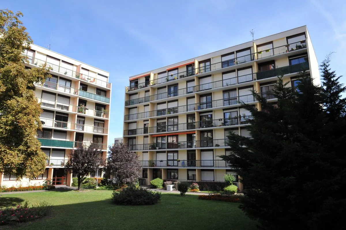 There are a few metrics used in calculating an appropriate price for purchasing an apartment in a building including cap rate and GRM. (Thierry Zoccolan/AFP/Getty Images)